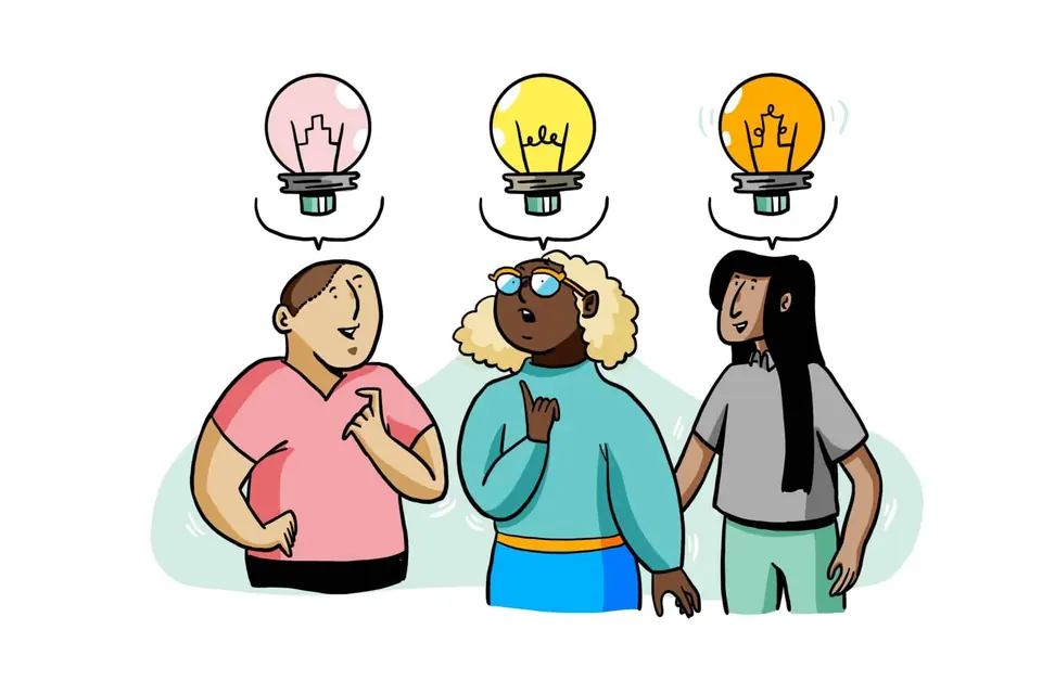 A group of people sharing ideas to combat a creativity slump.